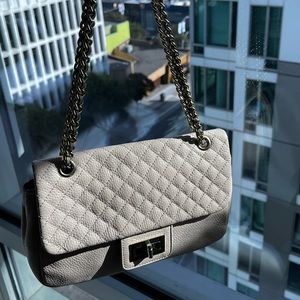 Very chic Karl Lagerfeld cross body or shoulder. Well loved but taken care of!